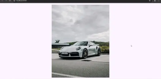 Animated demo: moving the cursor over a car photo zooms into that part of the image